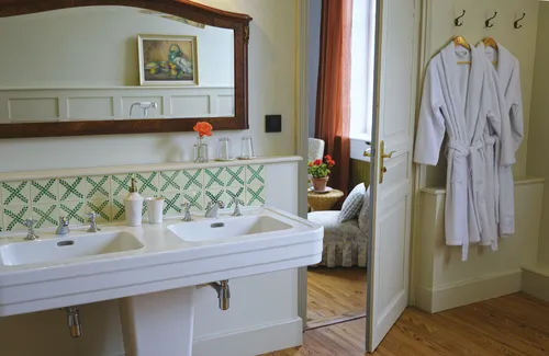 Bathroom sink with large mirror