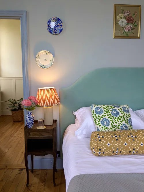 Bed and lampshade on a bedside table